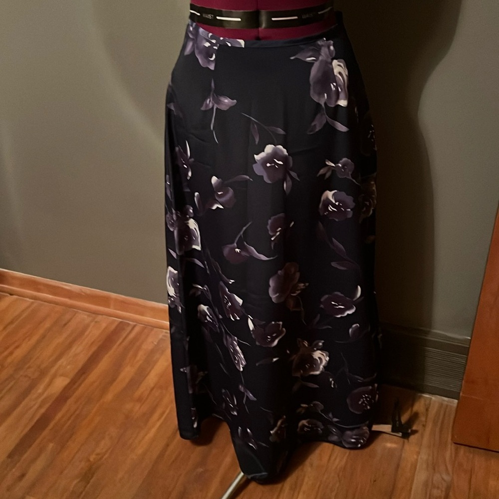 Long Flowered Skirt. Very neat looking. Hardly wore. Zipper on side